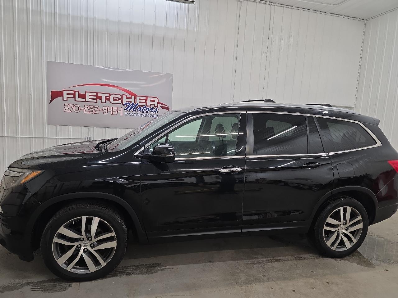 Honda Pilot AWD 4dr Touring w/RES & Navi 2016