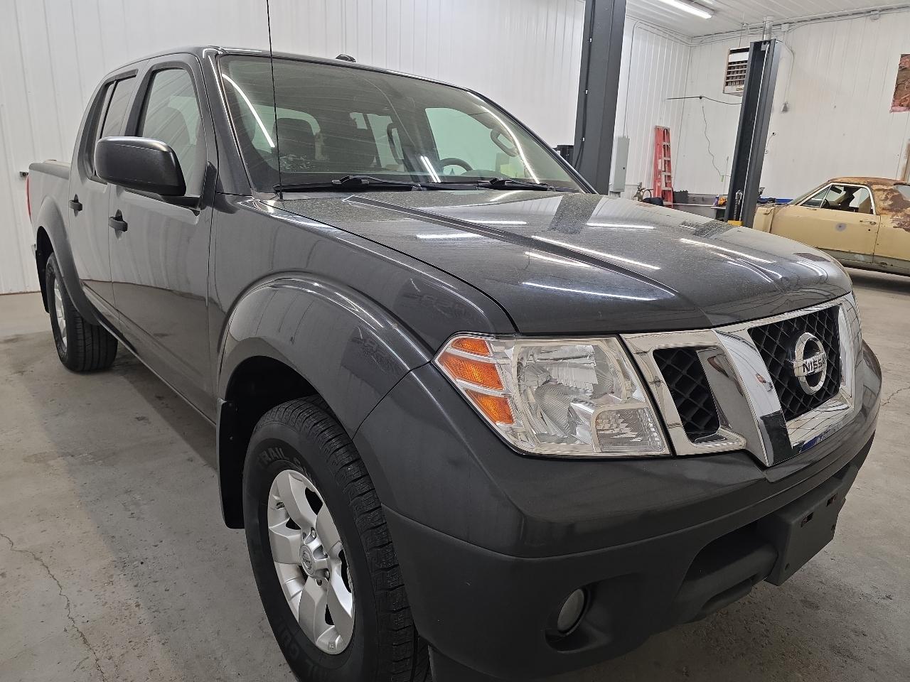 Nissan Frontier 4WD Crew Cab SWB Auto SV 2012