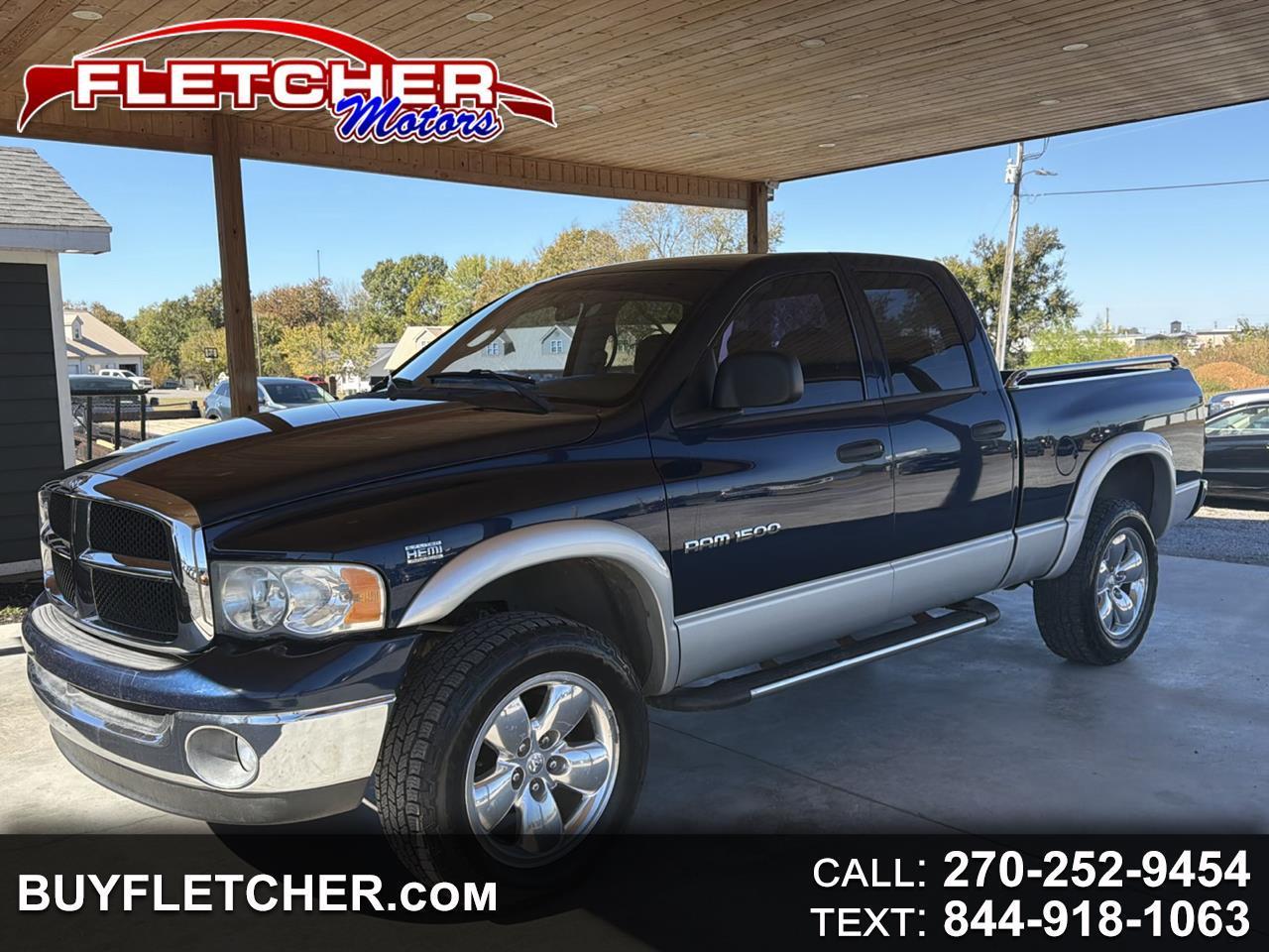 Blue 2004 Dodge RAM 1500 Pickup Truck Four-Wheel Drive Automatic