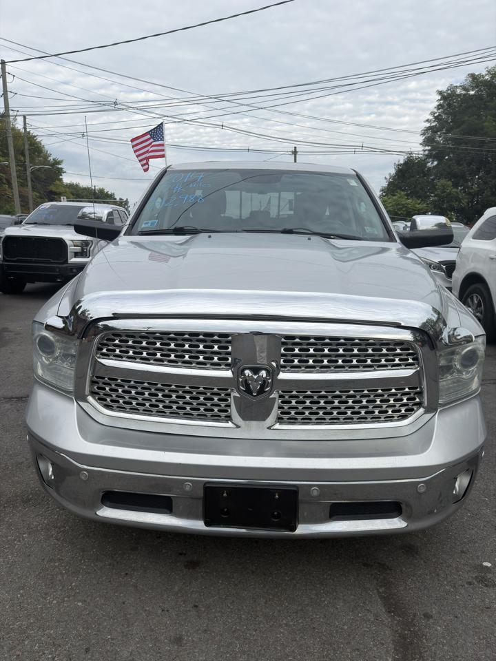 RAM 1500 4WD Quad Cab 140.5" Laramie 2014
