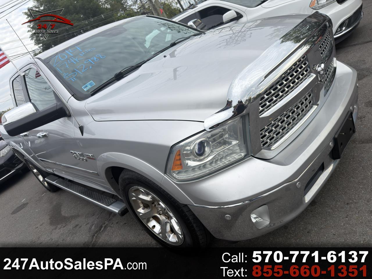RAM 1500 4WD Quad Cab 140.5" Laramie 2014