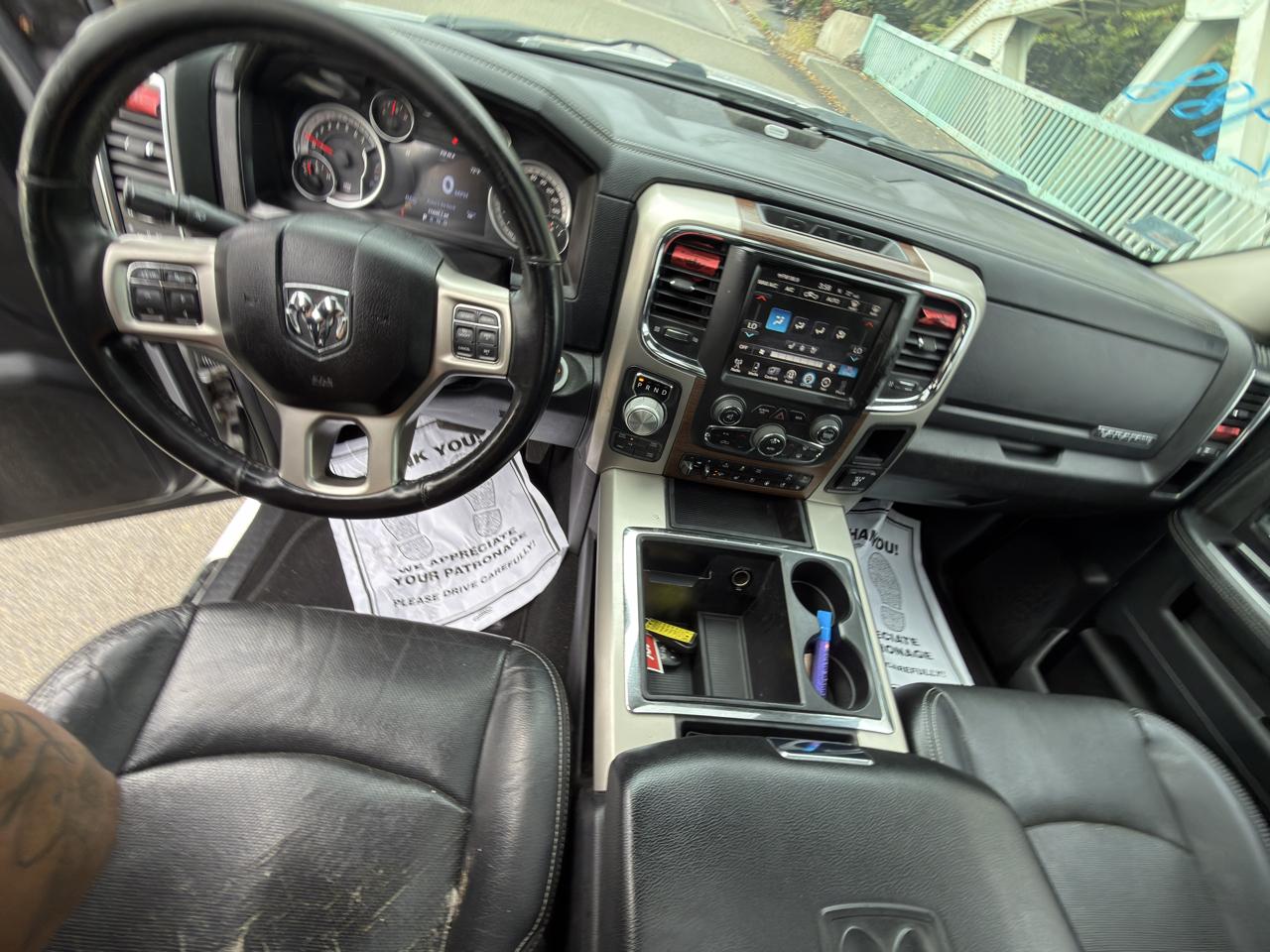 RAM 1500 4WD Quad Cab 140.5" Laramie 2014
