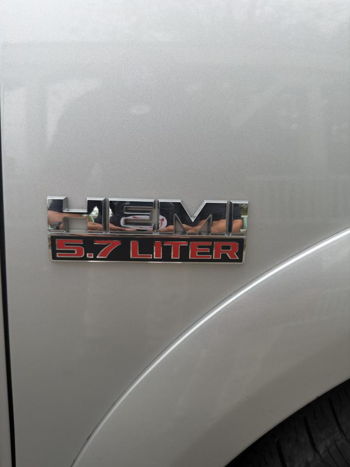 RAM 1500 4WD Quad Cab 140.5" Laramie 2014