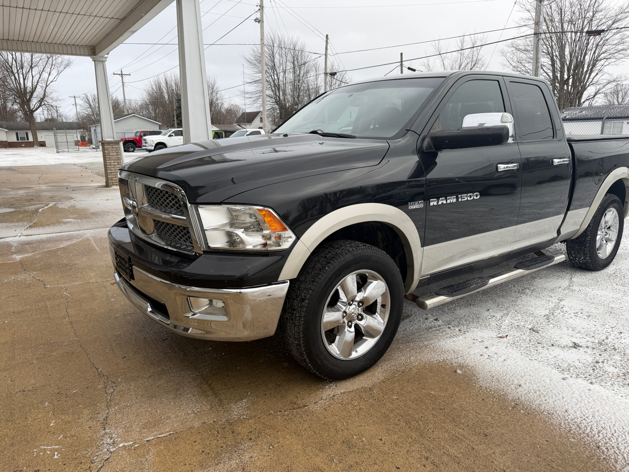 2011 RAM 1500 4WD Quad Cab 140.5" Laramie