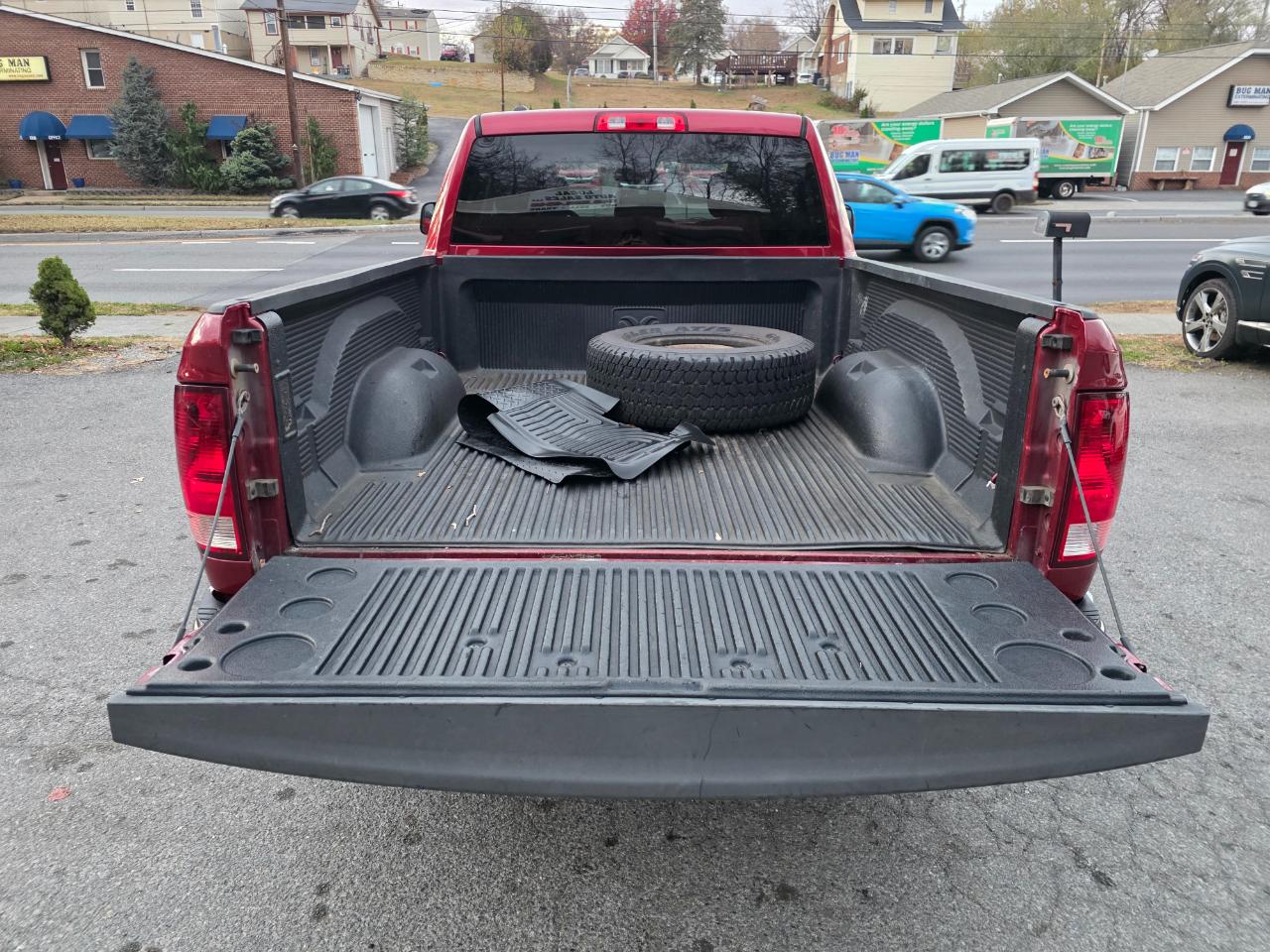 RAM 1500 4WD Quad Cab 140.5" ST 2015