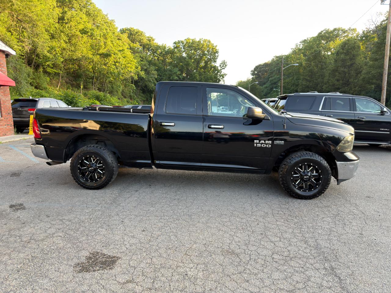 RAM 1500 4WD Quad Cab 140.5" SLT 2014