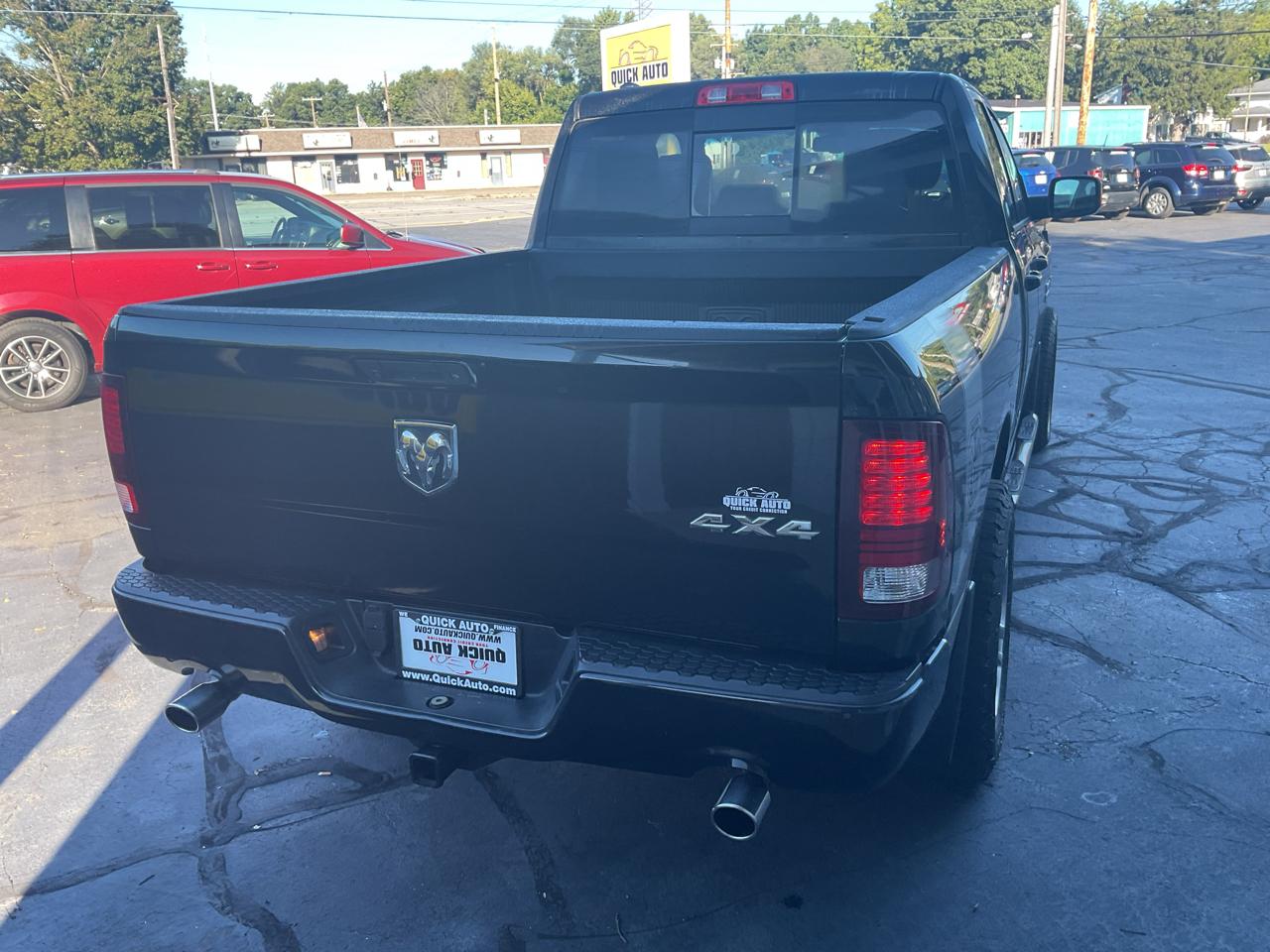 RAM 1500 4WD Quad Cab 140.5" Sport 2016