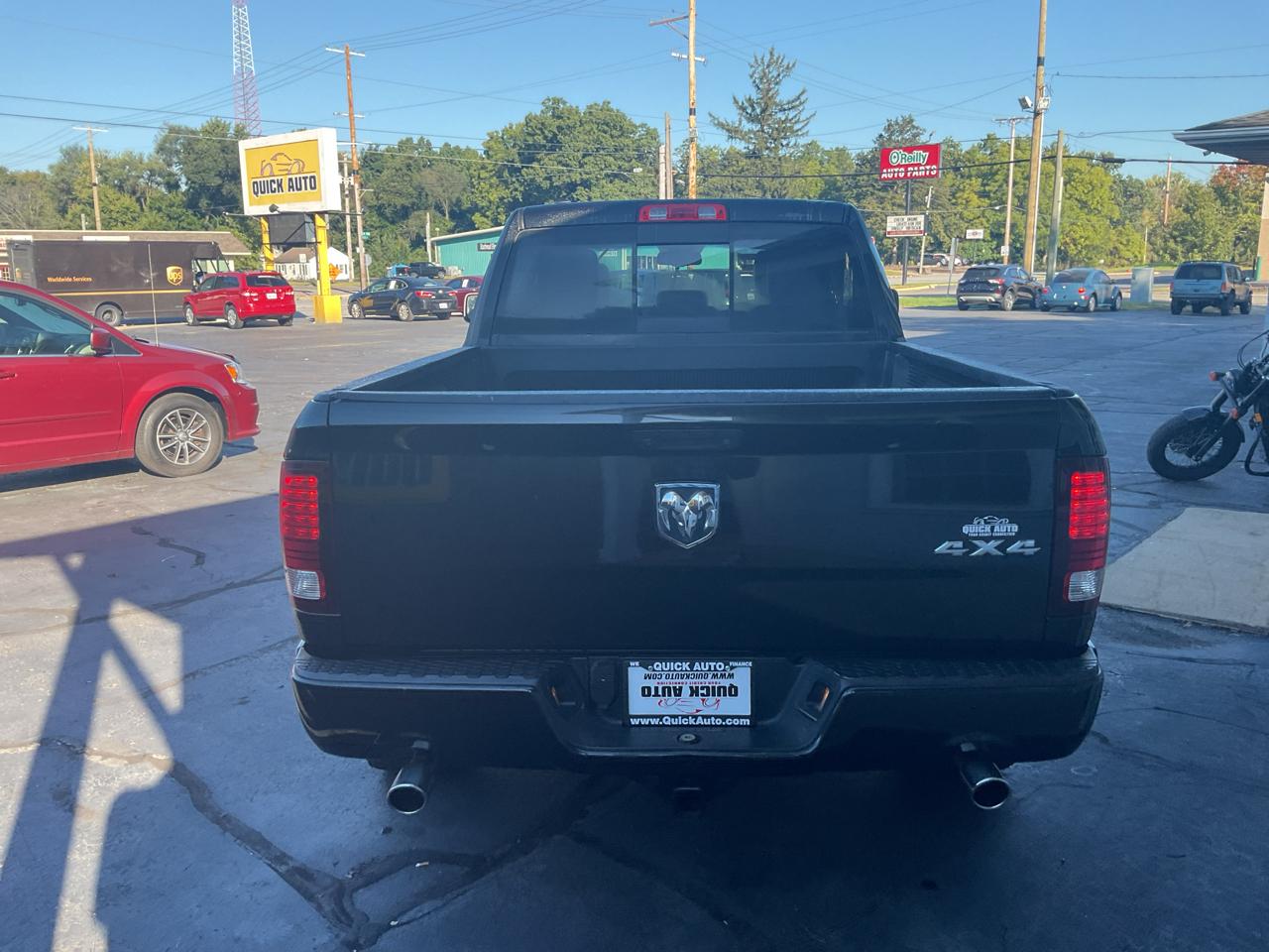 RAM 1500 4WD Quad Cab 140.5" Sport 2016