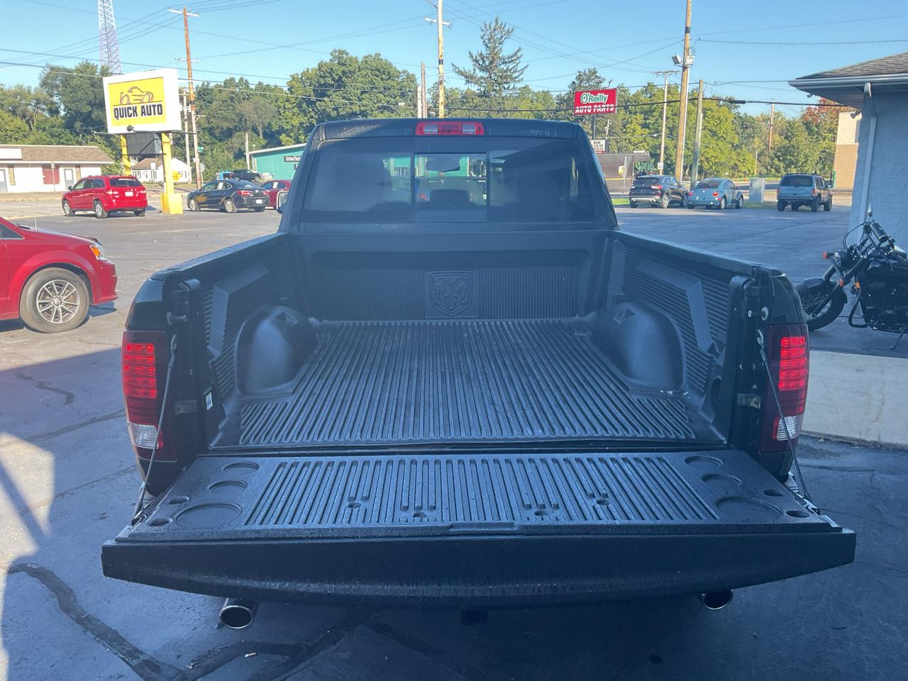 RAM 1500 4WD Quad Cab 140.5" Sport 2016