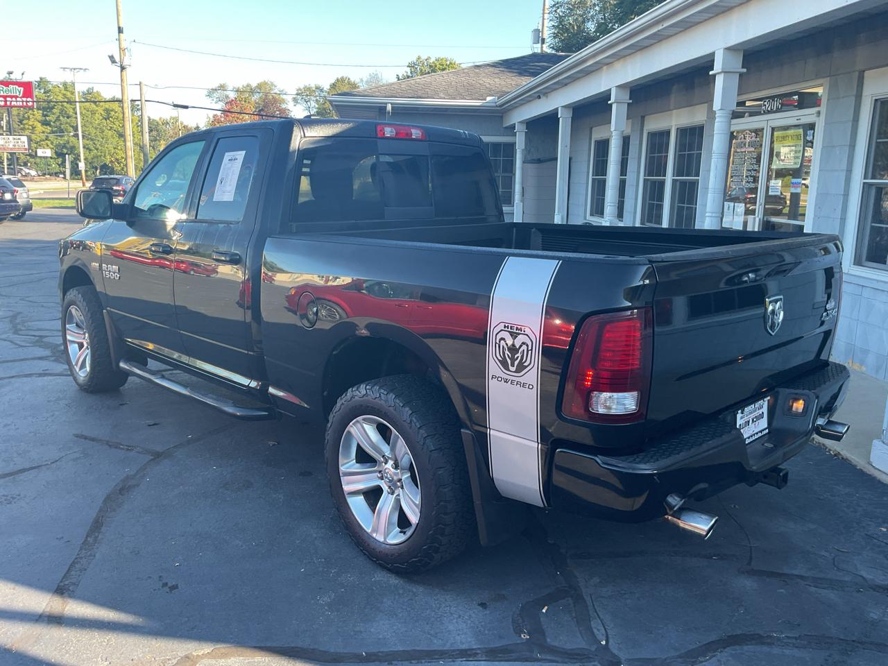 RAM 1500 4WD Quad Cab 140.5" Sport 2016