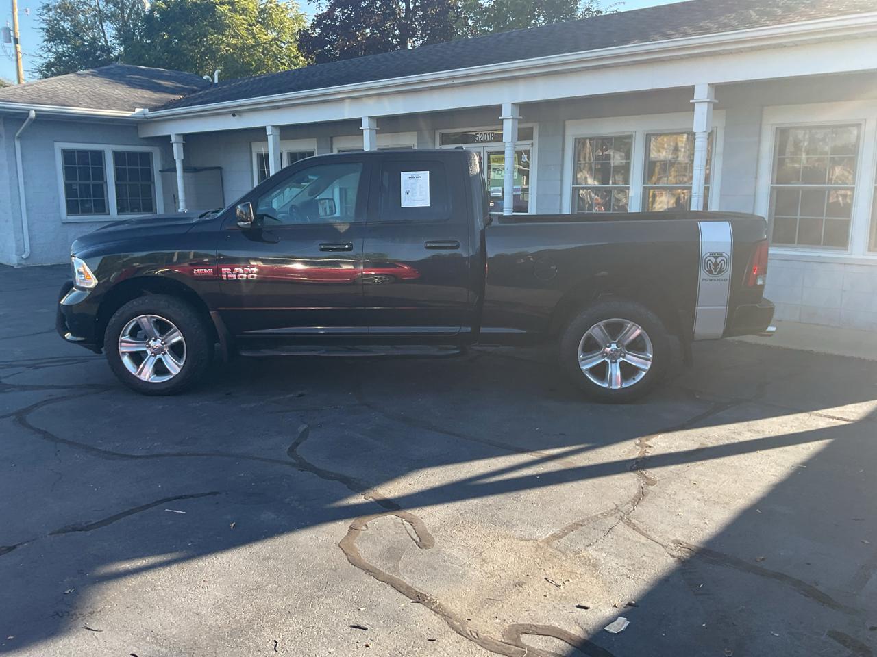 RAM 1500 4WD Quad Cab 140.5" Sport 2016