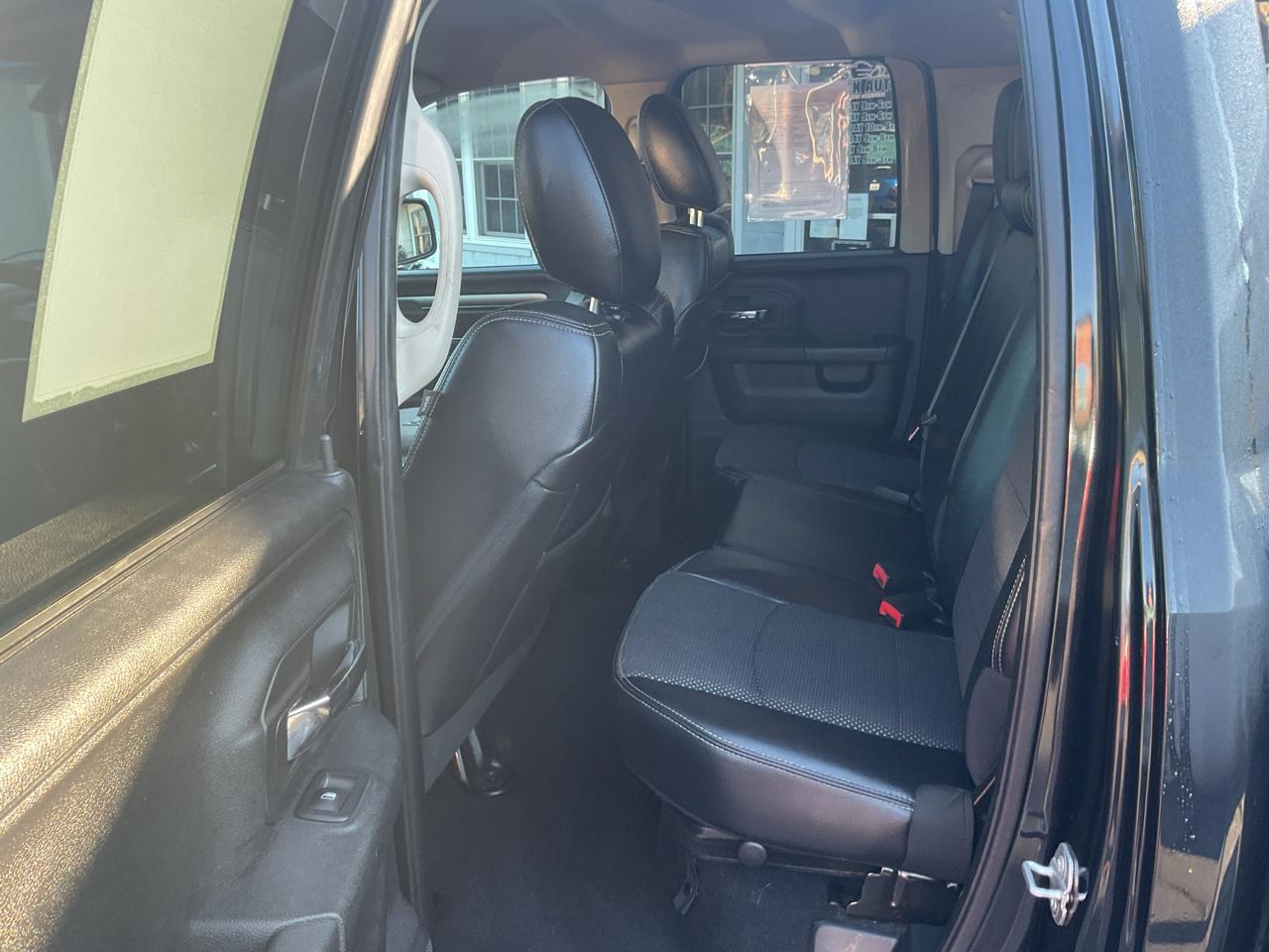 RAM 1500 4WD Quad Cab 140.5" Sport 2016