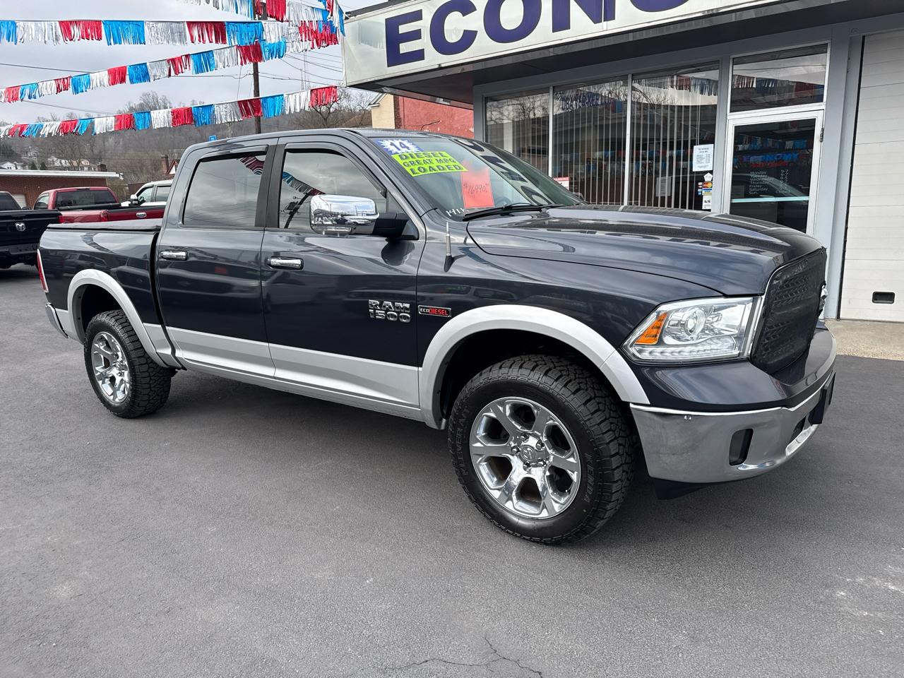 2014 RAM 1500 4WD Crew Cab 140.5" Laramie