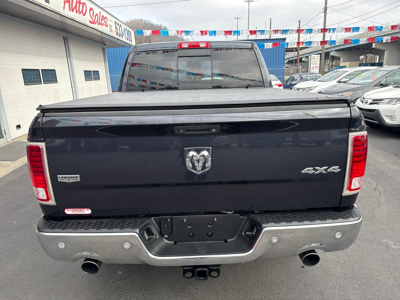 RAM 1500 4WD Crew Cab 140.5" Laramie 2014