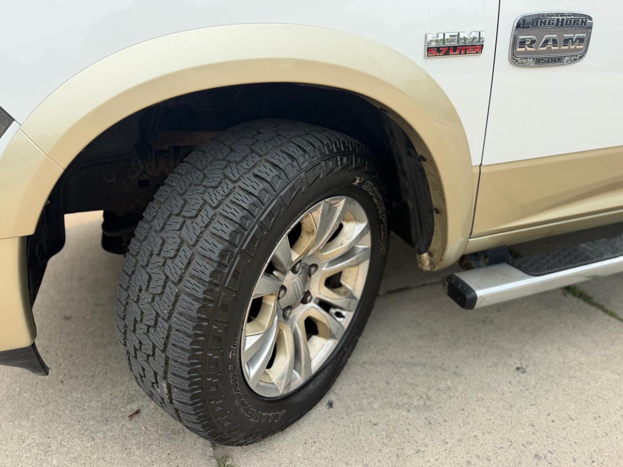 RAM 1500 4WD Crew Cab 140.5" Laramie Longhorn 2013