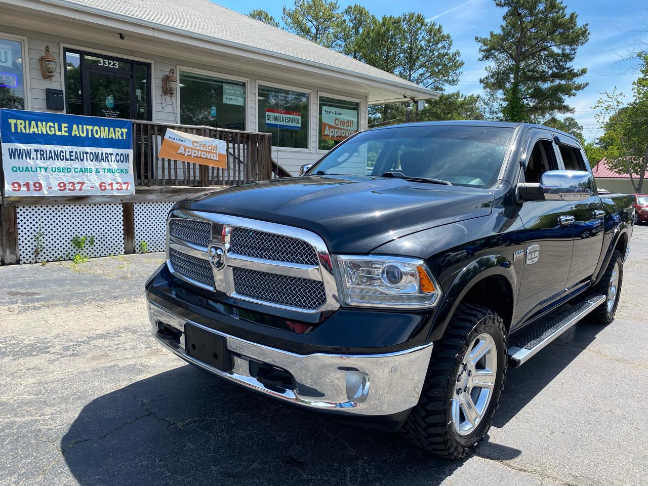 2016 RAM 1500 4WD Crew Cab 140.5" Laramie Longhorn