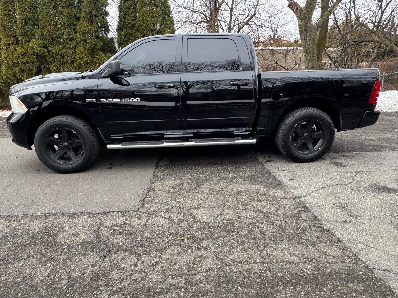 RAM 1500 4WD Crew Cab 149" Sport 2012