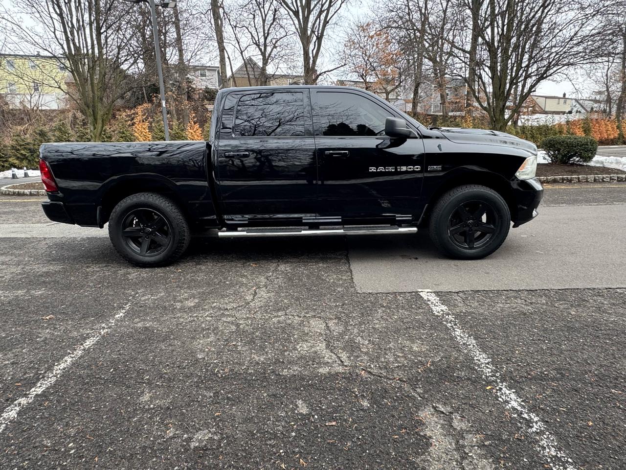 RAM 1500 4WD Crew Cab 149" Sport 2012