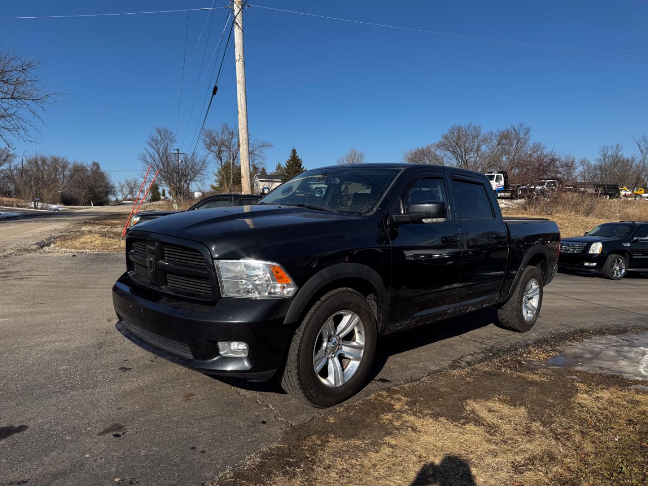 RAM 1500 4WD Crew Cab 140.5" Sport 2011