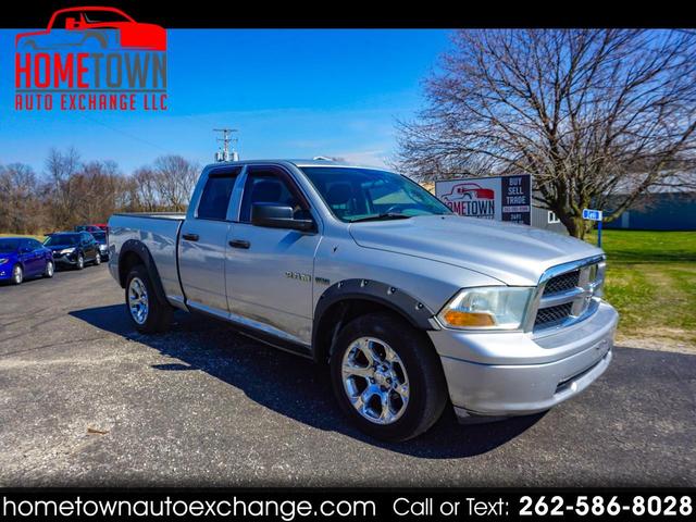 Silver 2010 Dodge RAM 1500 ST Quad Cab 4WD Pickup Truck Four-Wheel Drive Automatic