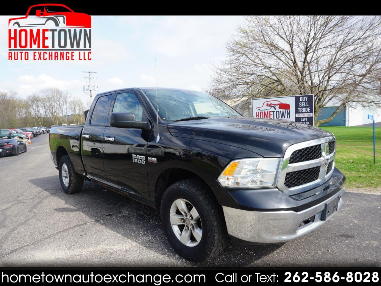 2014 RAM 1500 4WD Quad Cab 140.5" SLT