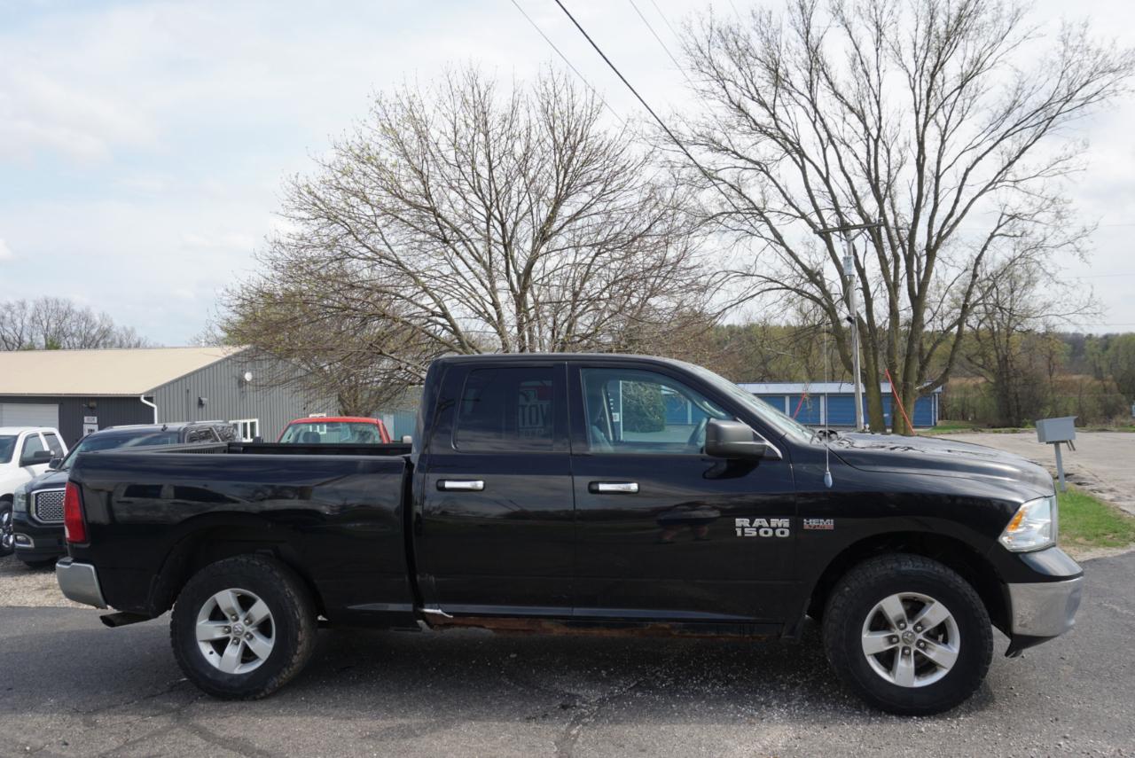RAM 1500 4WD Quad Cab 140.5" SLT 2014