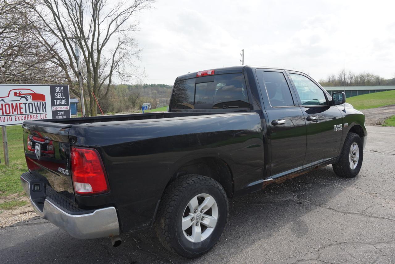 RAM 1500 4WD Quad Cab 140.5" SLT 2014