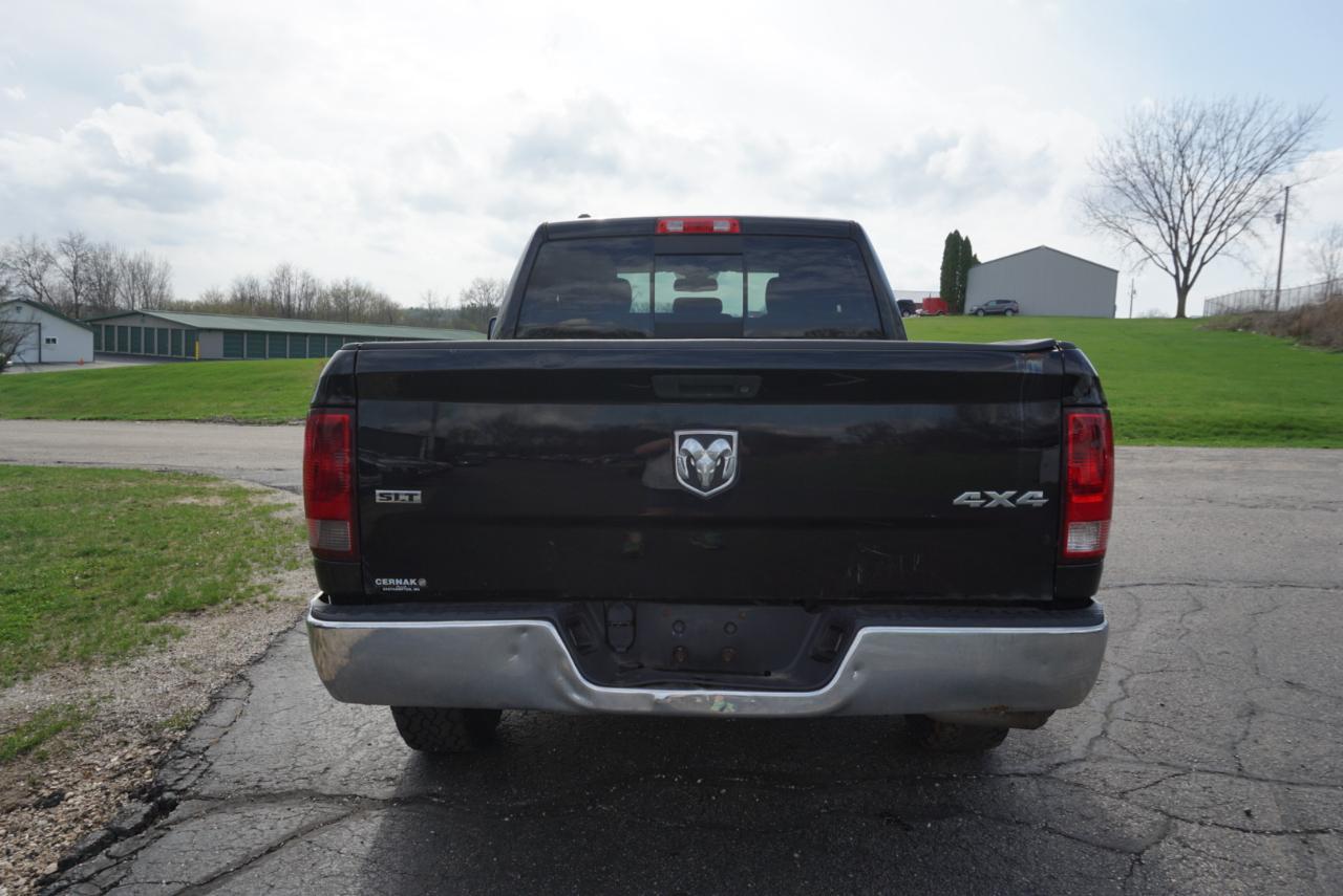 RAM 1500 4WD Quad Cab 140.5" SLT 2014