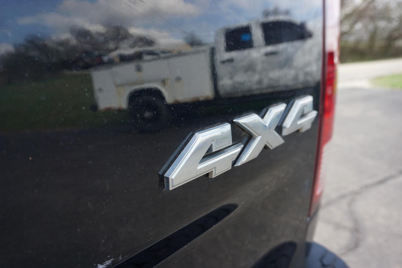 RAM 1500 4WD Quad Cab 140.5" SLT 2014