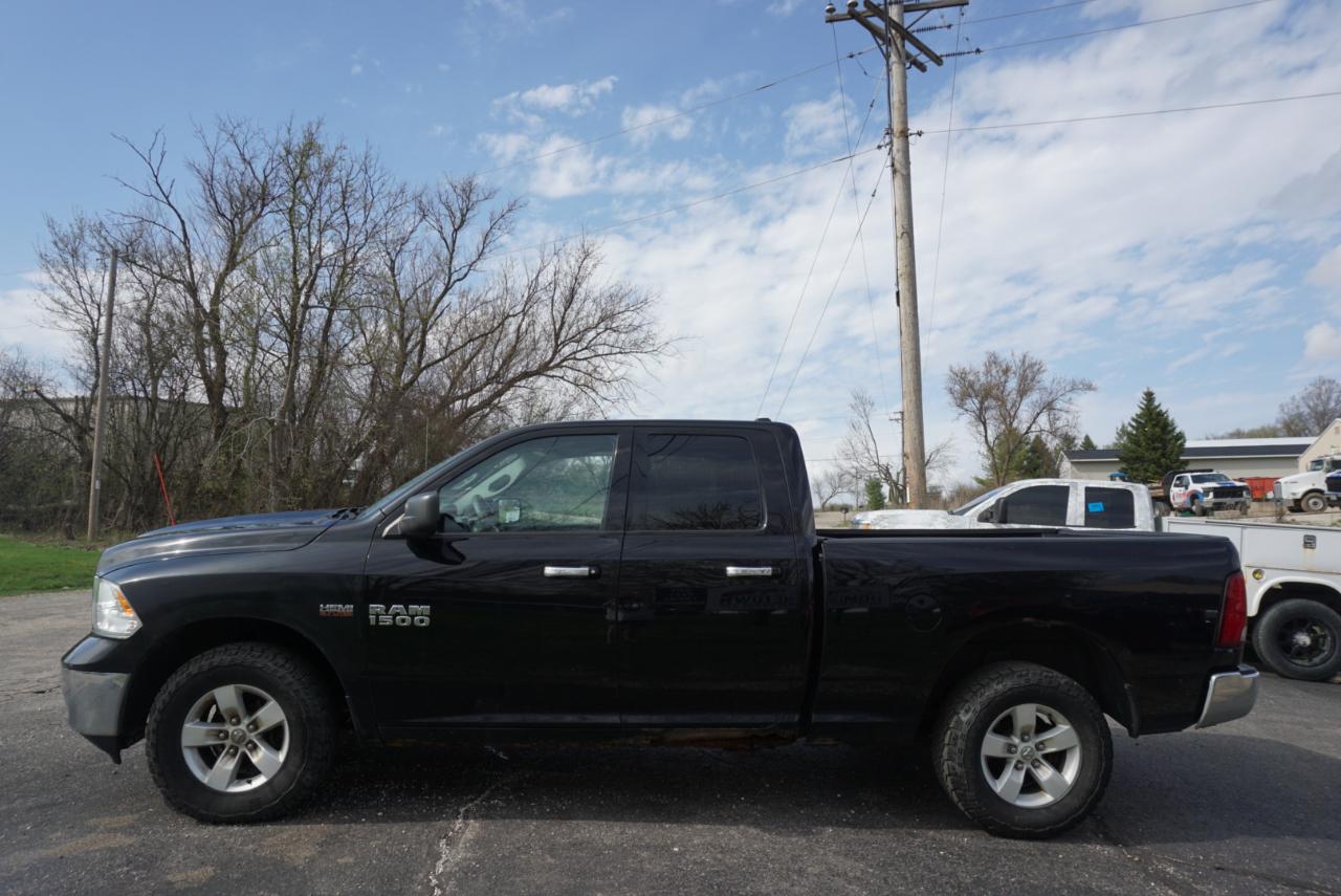 RAM 1500 4WD Quad Cab 140.5" SLT 2014