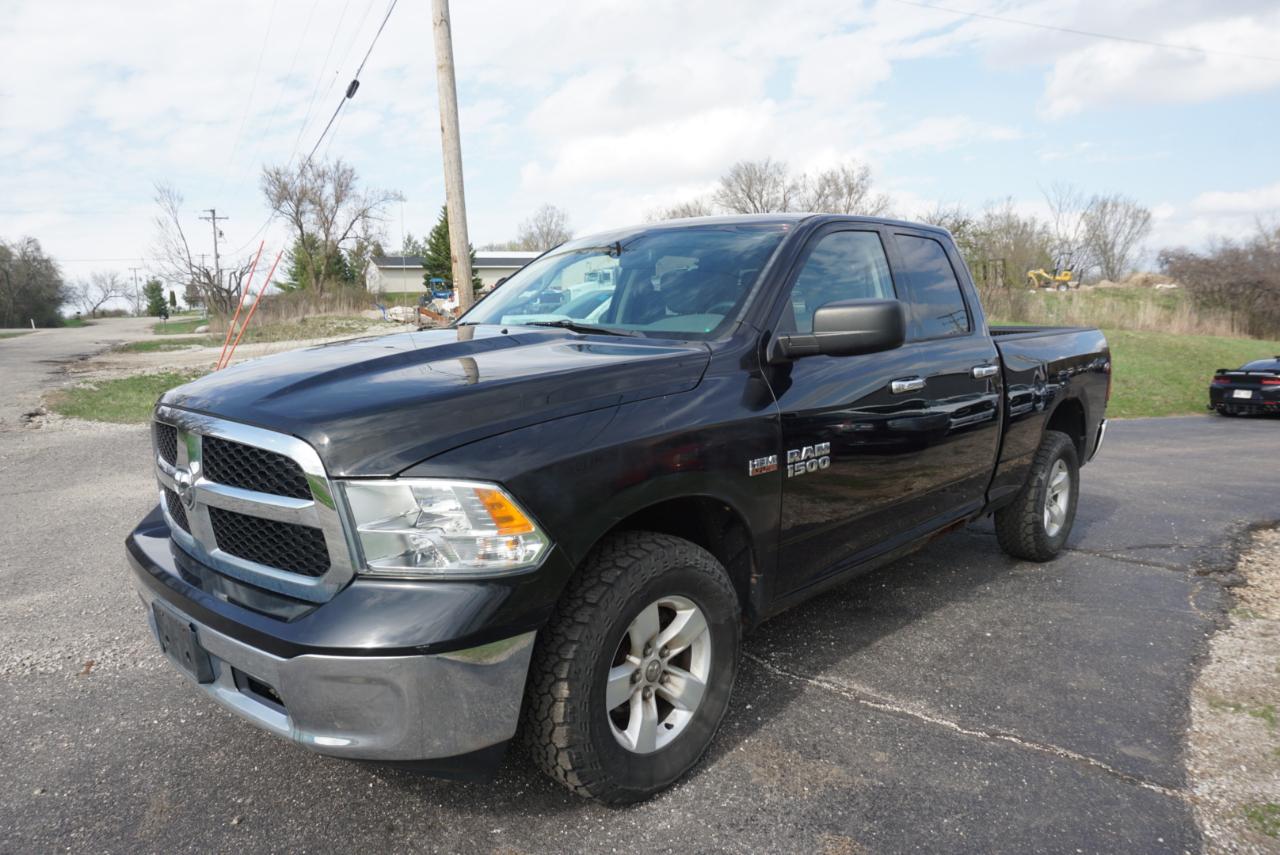 RAM 1500 4WD Quad Cab 140.5" SLT 2014
