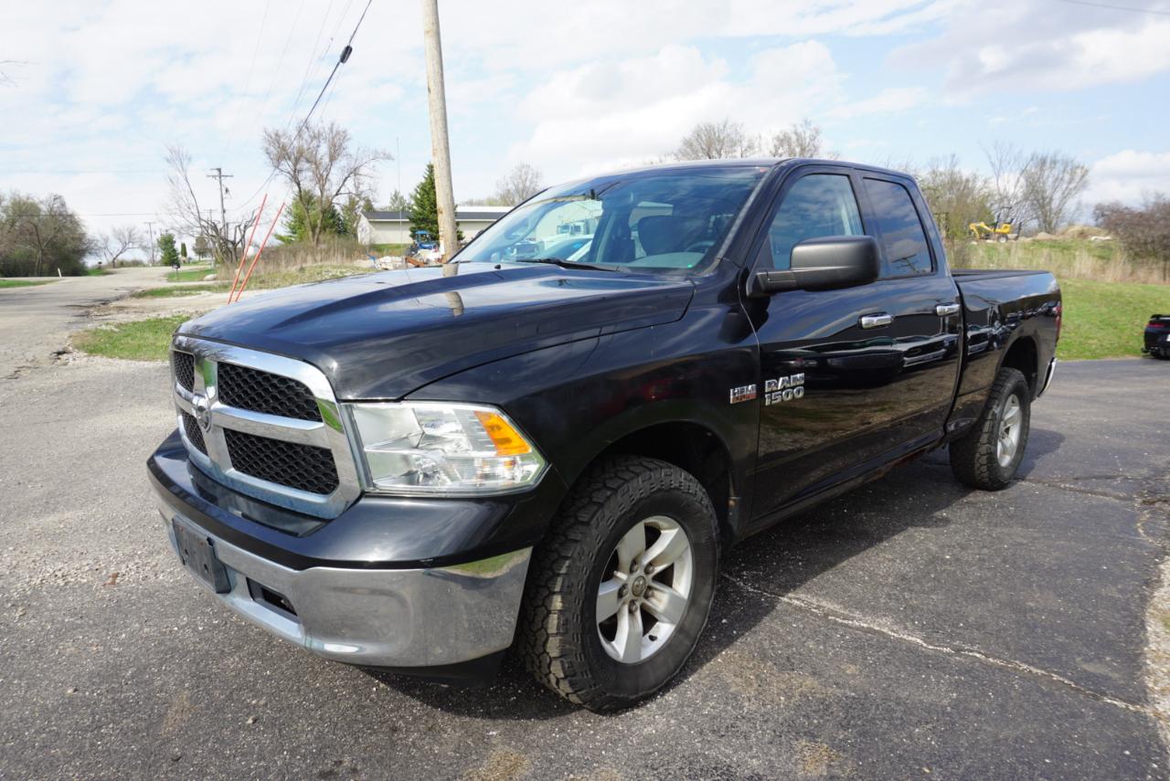 RAM 1500 4WD Quad Cab 140.5" SLT 2014