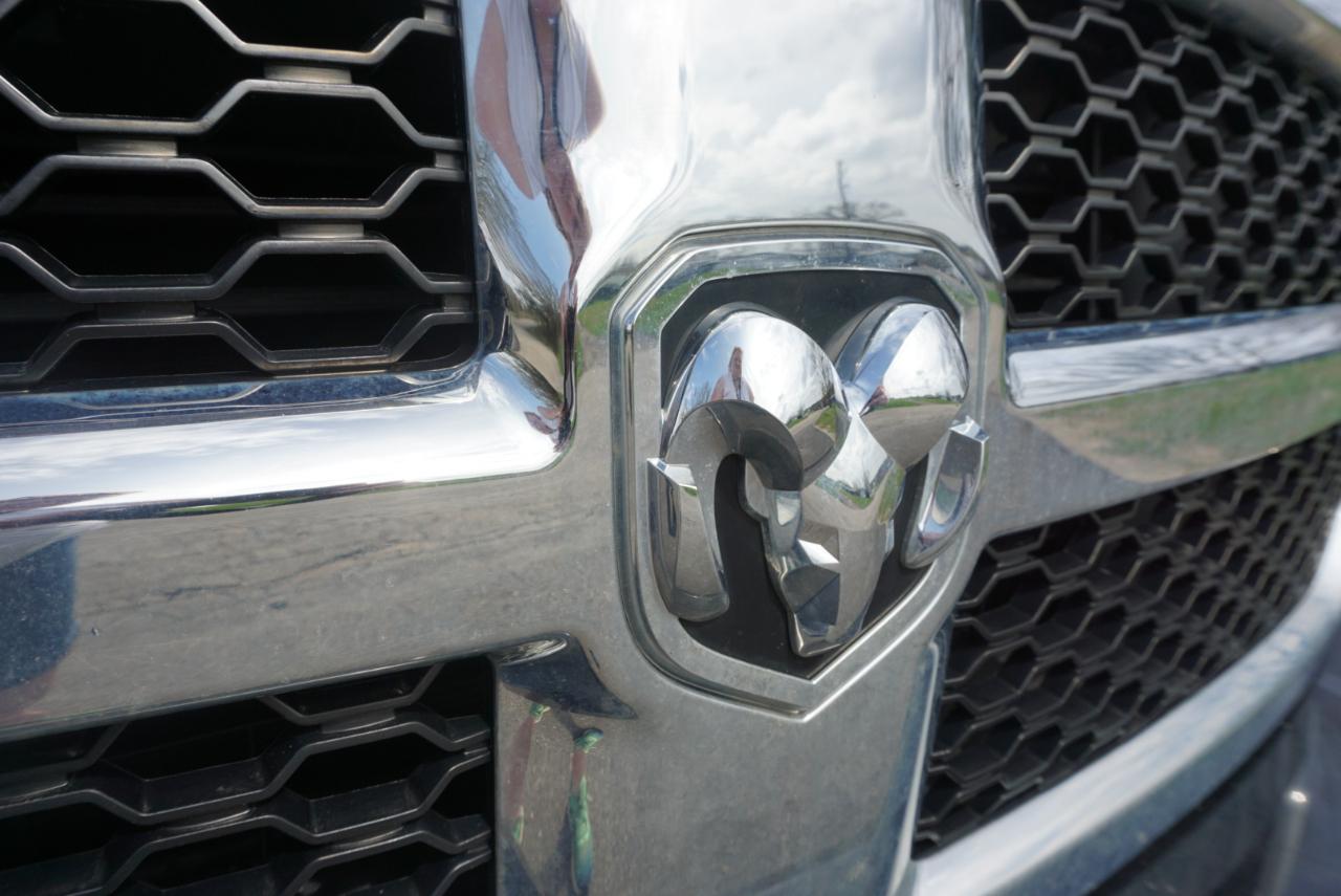 RAM 1500 4WD Quad Cab 140.5" SLT 2014