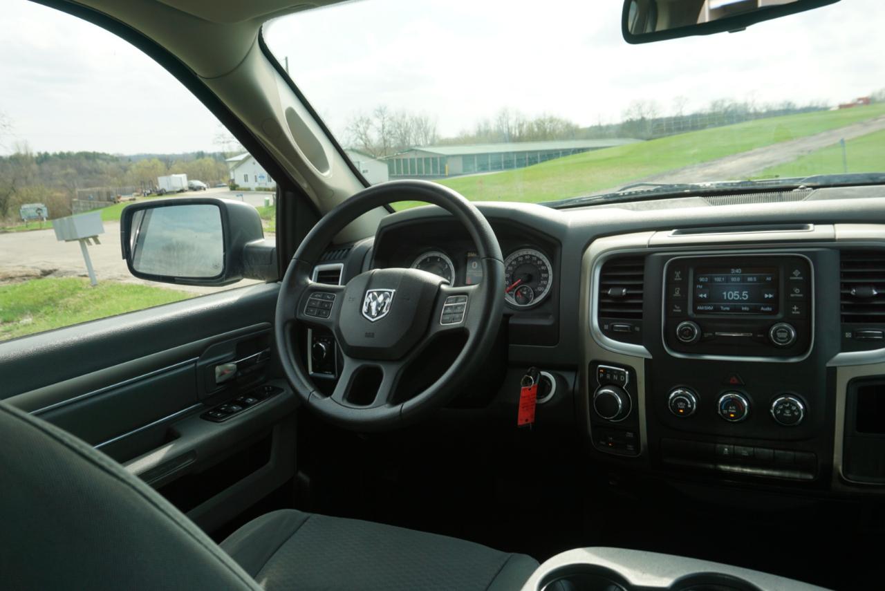 RAM 1500 4WD Quad Cab 140.5" SLT 2014