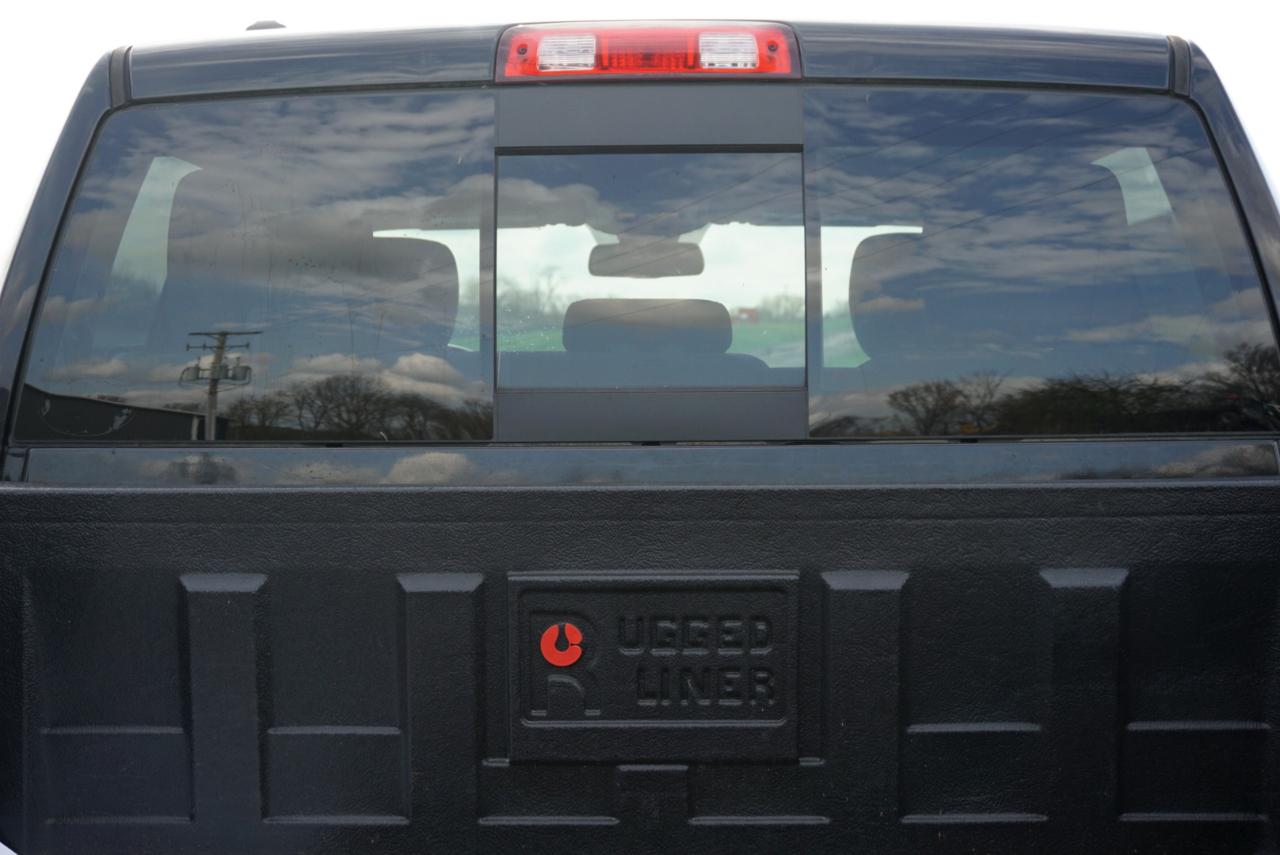 RAM 1500 4WD Quad Cab 140.5" SLT 2014