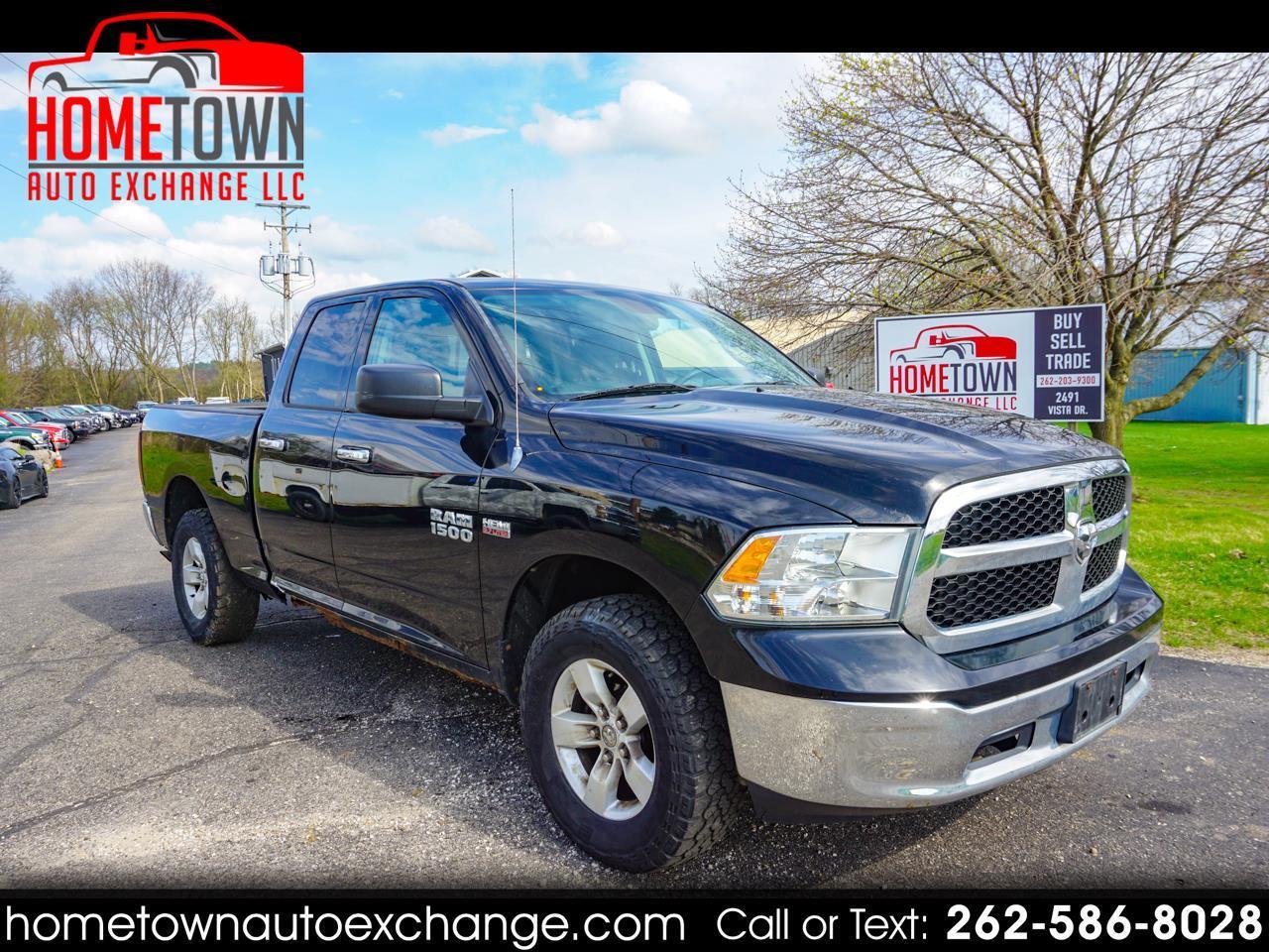 2014 RAM 1500 4WD Quad Cab 140.5" SLT