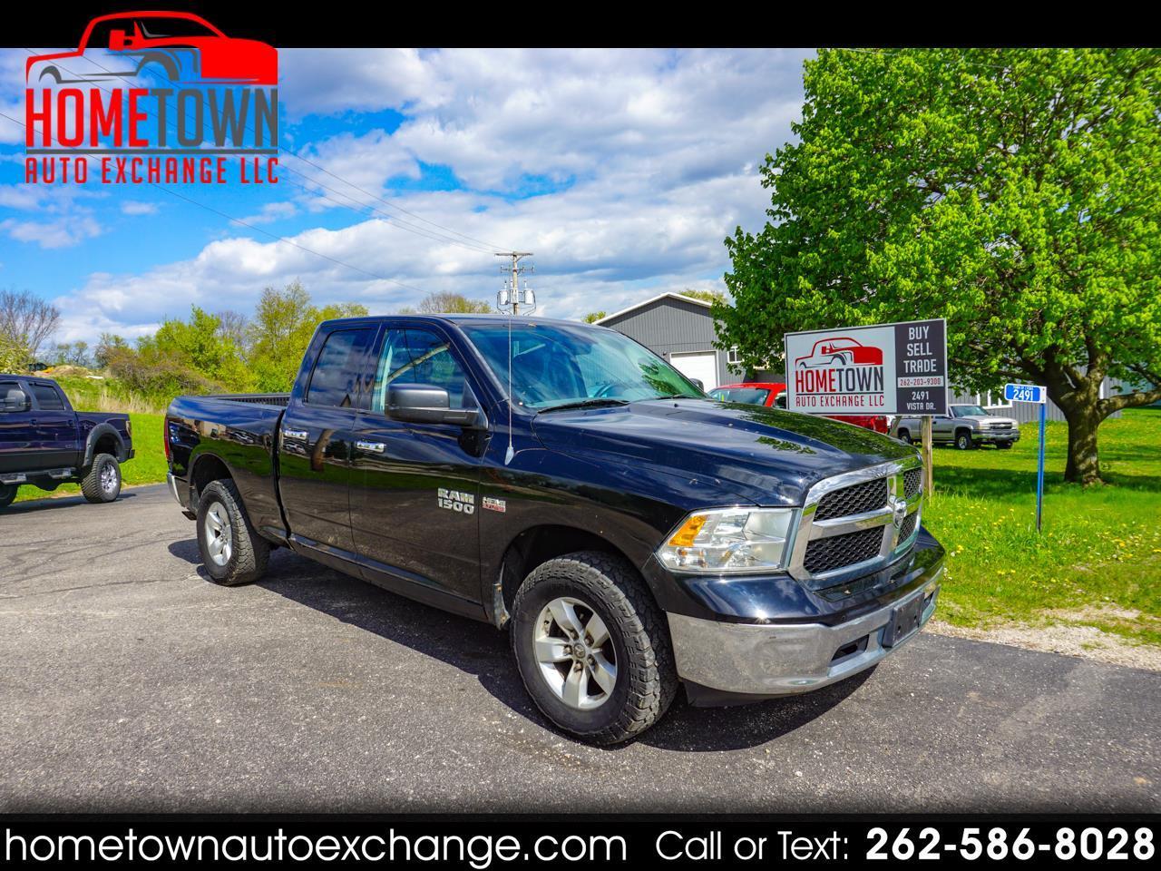 2014 RAM 1500 4WD Quad Cab 140.5" SLT