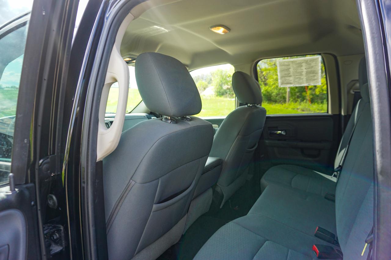 RAM 1500 4WD Quad Cab 140.5" SLT 2014