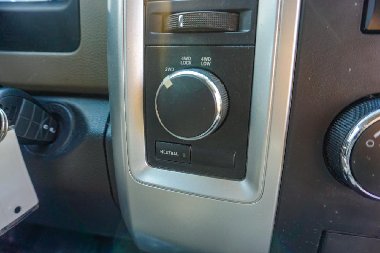 RAM 1500 4WD Quad Cab 140.5" SLT 2011