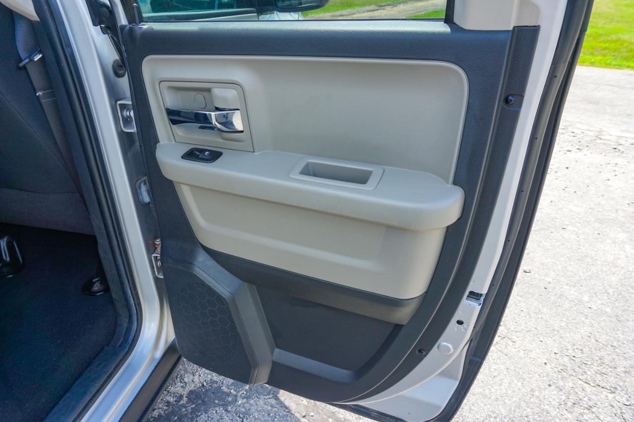 RAM 1500 4WD Quad Cab 140.5" SLT 2011