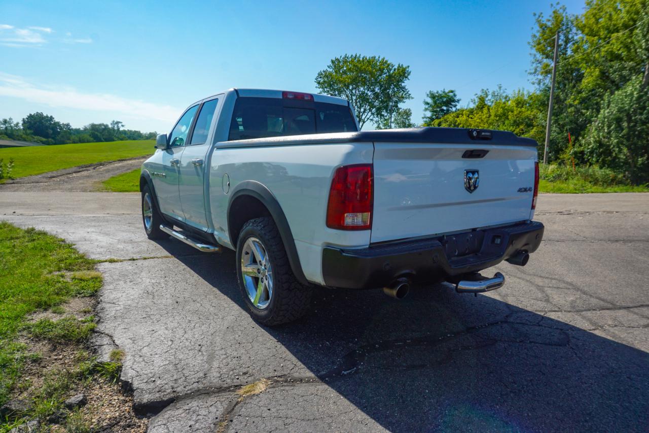 RAM 1500 4WD Quad Cab 140.5" Sport 2011