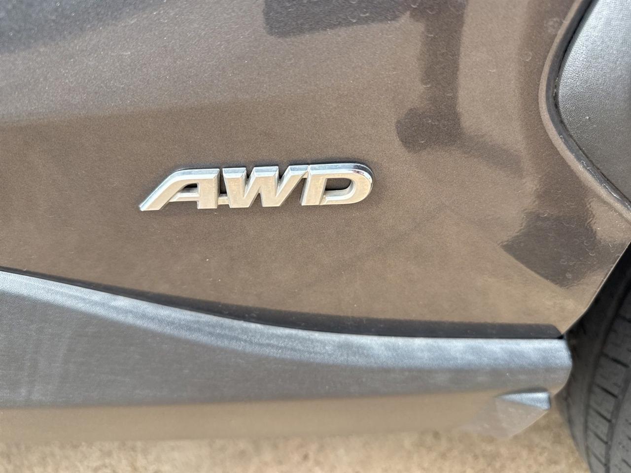 Toyota RAV4 Hybrid XLE AWD (Natl) 2021