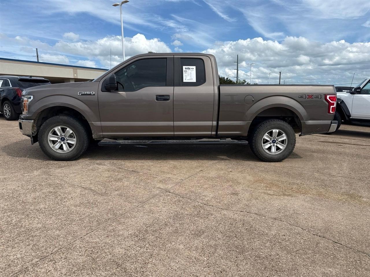 Ford F-150 Lariat 4WD SuperCab 8' Box 2018
