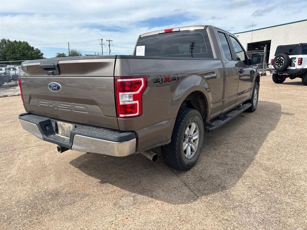 Ford F-150 Lariat 4WD SuperCab 8' Box 2018
