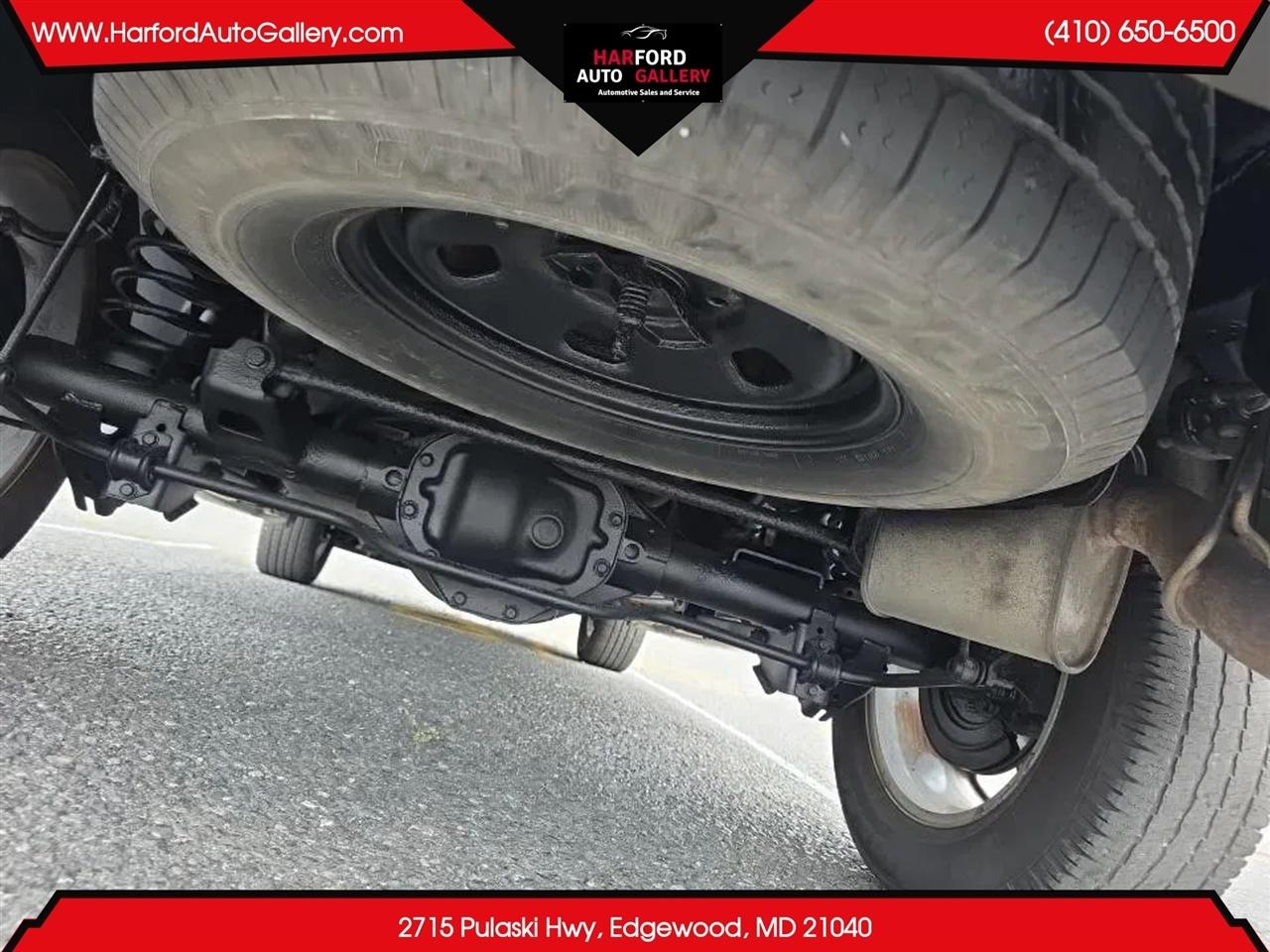 RAM 1500 4WD Quad Cab 140.5" SLT 2014