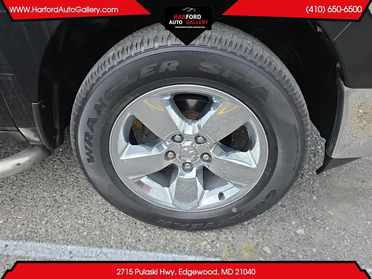 RAM 1500 4WD Quad Cab 140.5" SLT 2014