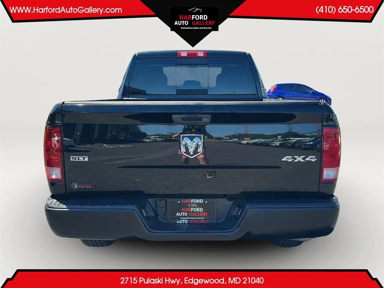 RAM 1500 4WD Quad Cab 140.5" SLT 2014
