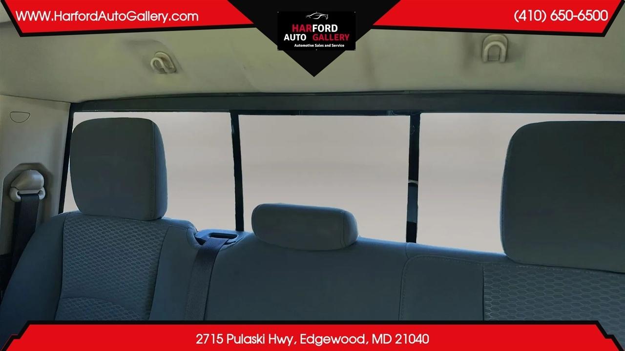 RAM 1500 4WD Quad Cab 140.5" SLT 2014