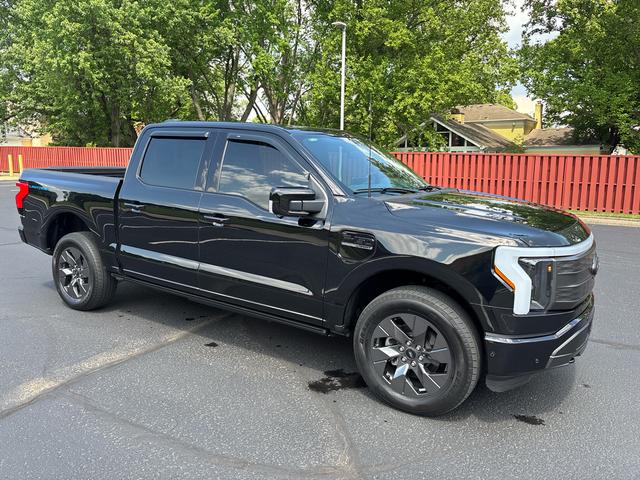 Black 2023 Ford F-150 Lightning Lariat SuperCrew AWD Pickup Truck All-Wheel Drive Continuously Variable Transmission