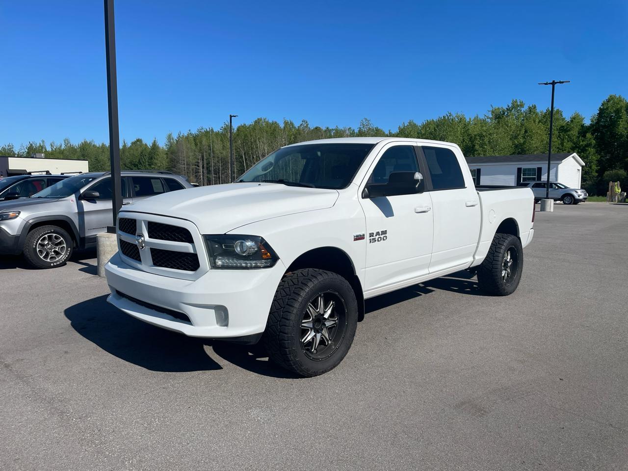 2017 RAM 1500 4WD Crew Cab 140.5" Sport